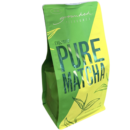 Green and yellow package of pure matcha on a white background