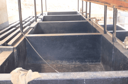 Concrete fermentation and soaking tanks at Kiamugumo Coffee Factory, Kirinyaga, Kenya