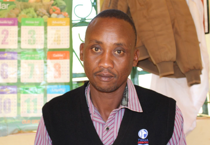 A staff member at Kiamugumo Coffee Factory, Kirinyaga, Kenya