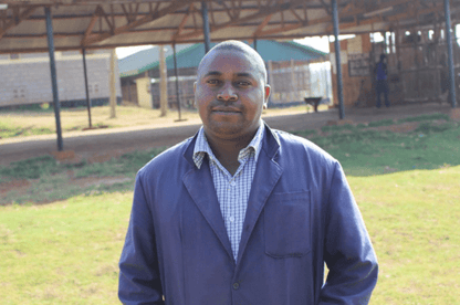 A staff member on site at Kiamugumo Coffee Factory, Kirinyaga, Kenya